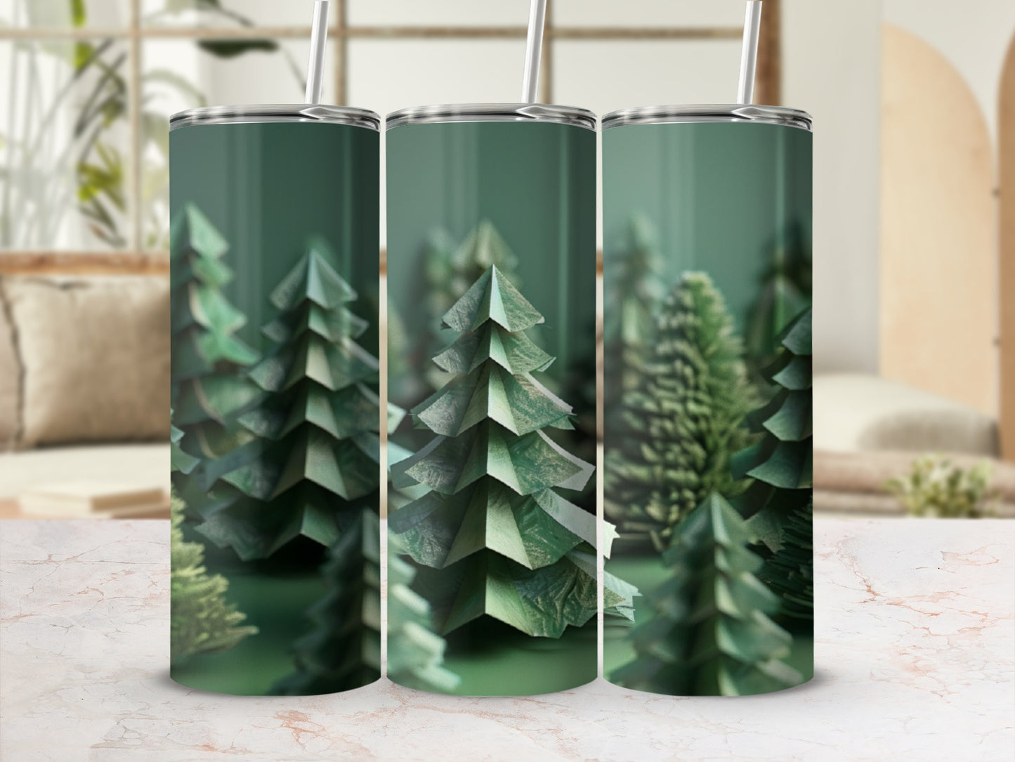 Three tumblers with a forest of papercraft trees design.