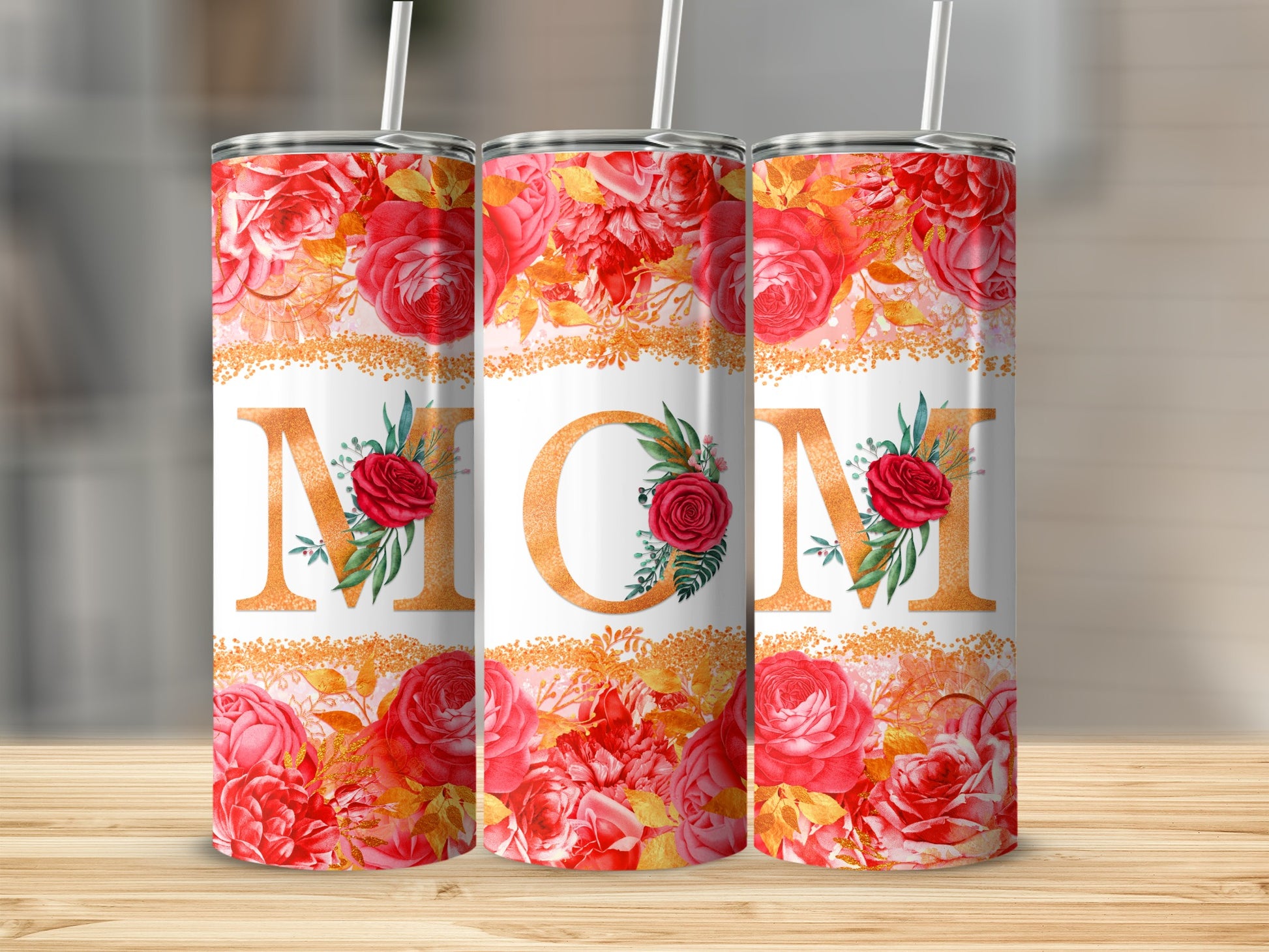Three tumblers with floral design and "MOM" text.