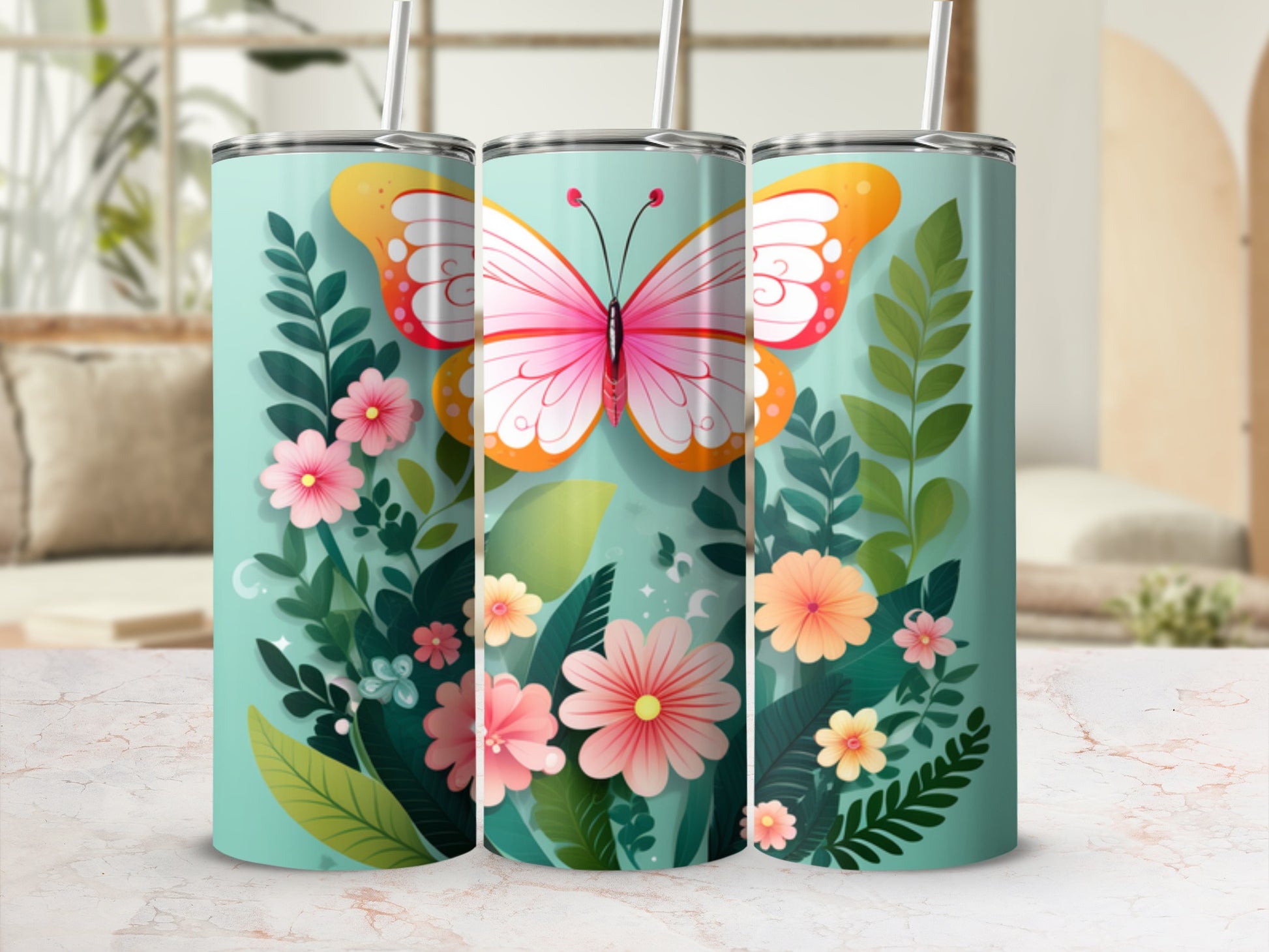 Butterfly and floral design on a teal tumbler with straw.