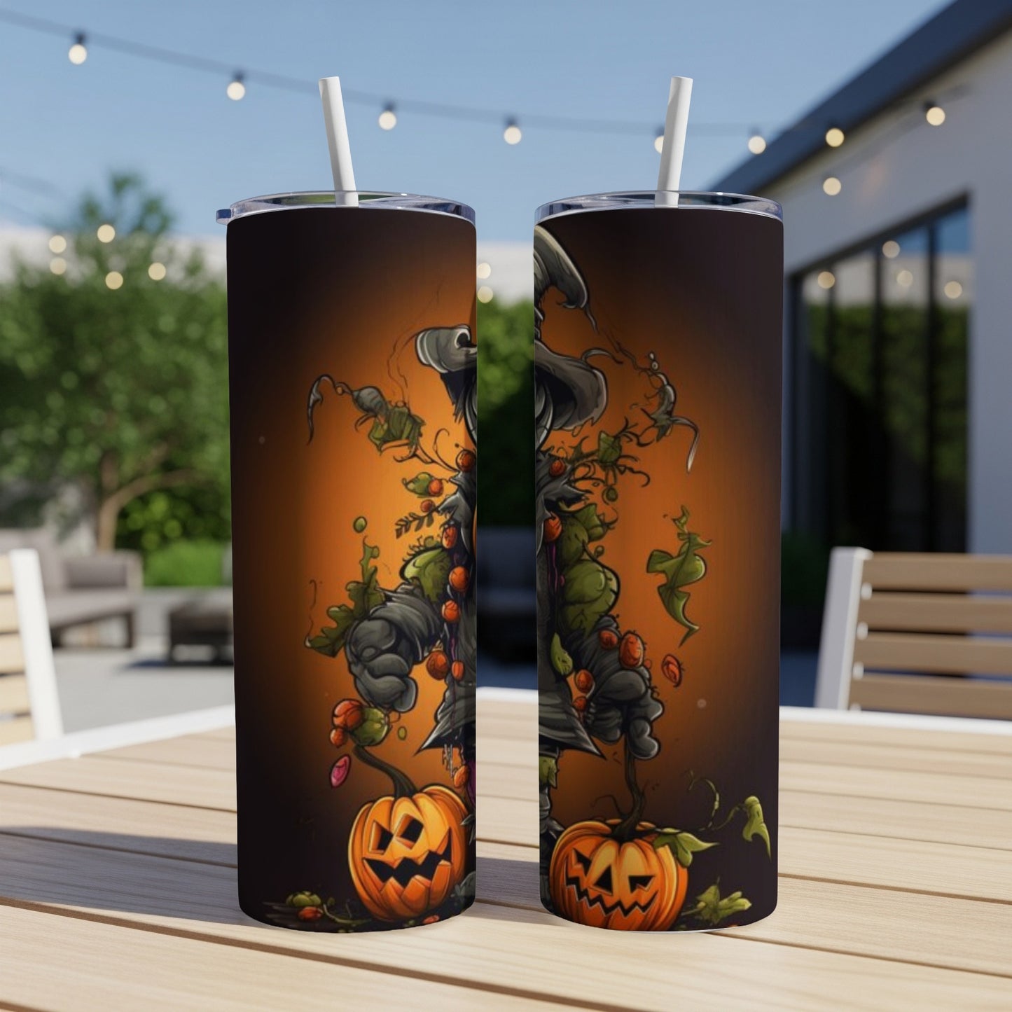 Two tumblers feature a Halloween design with a spooky scarecrow and pumpkins on an orange background.