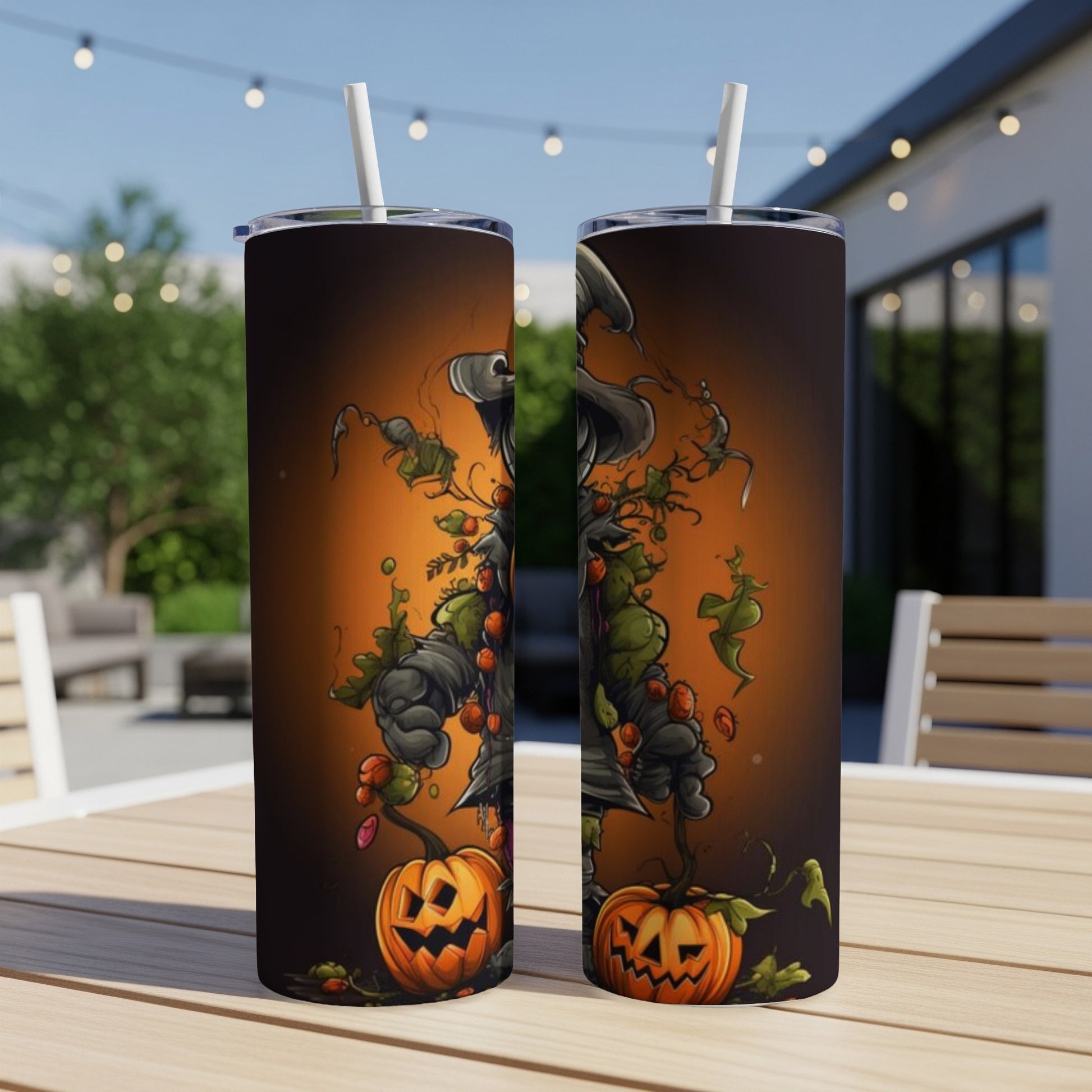 Two tumblers feature a Halloween design with a spooky scarecrow and pumpkins on an orange background.