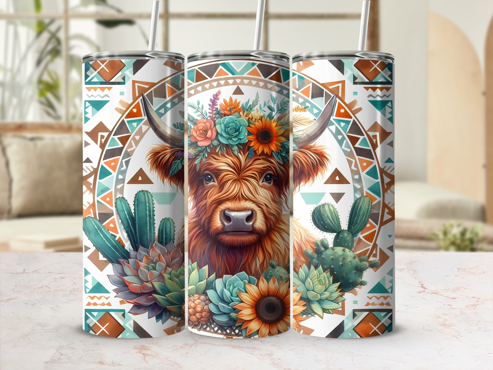 Highland cow with floral crown and desert succulents on patterned tumblers.