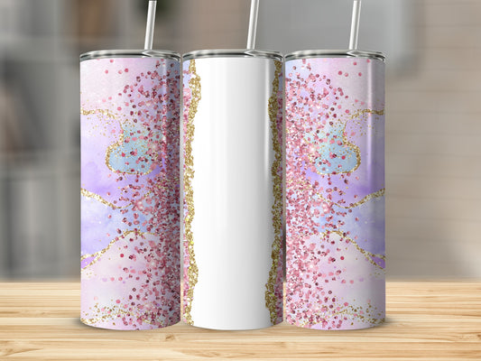 Three tumblers with purple and pink glitter designs and gold accents.