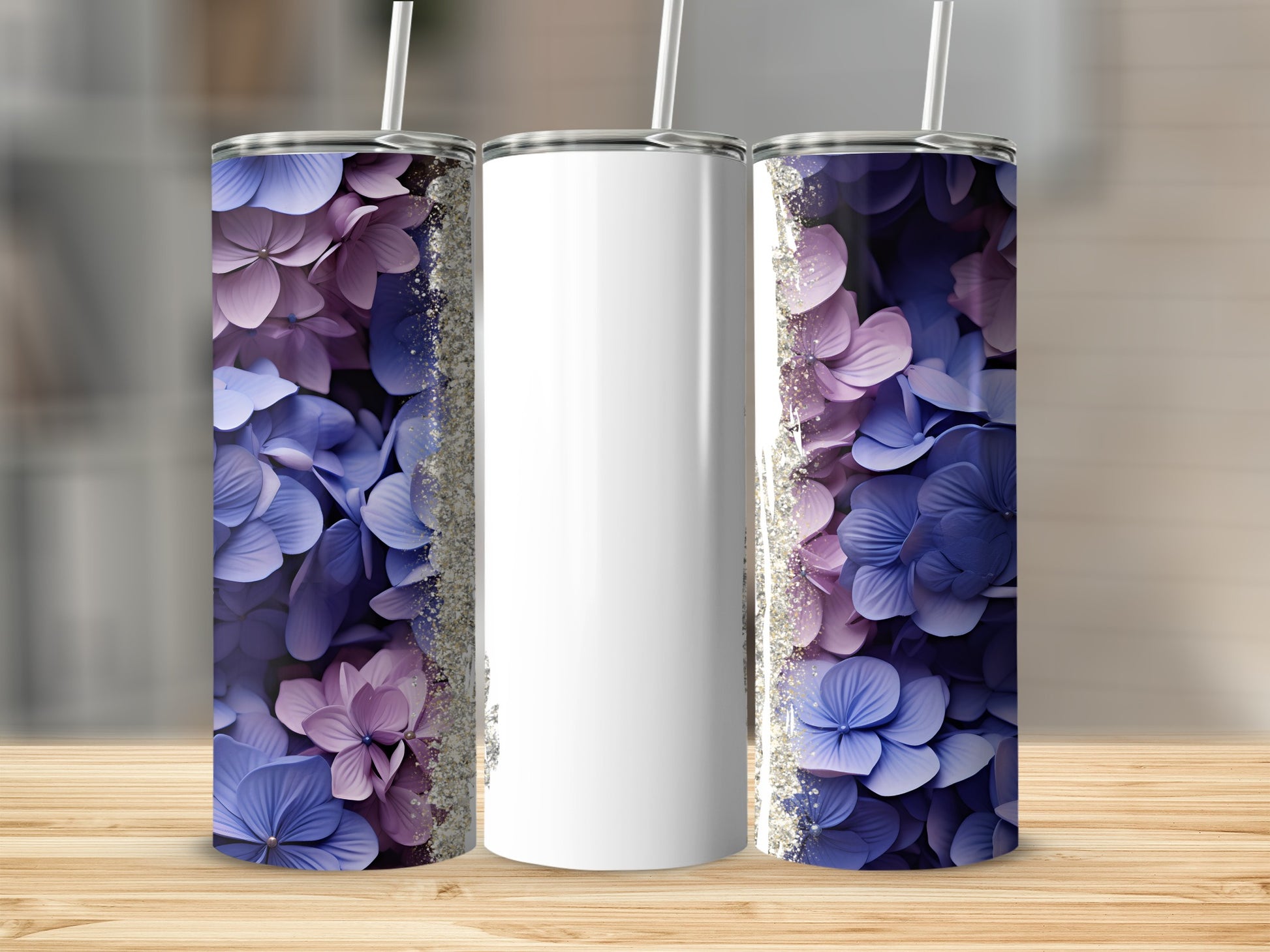 Three tumblers with purple and blue hydrangeas and glitter accents.