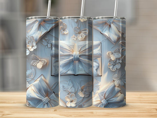 Three tall tumblers with white ribbon and floral embellishments.