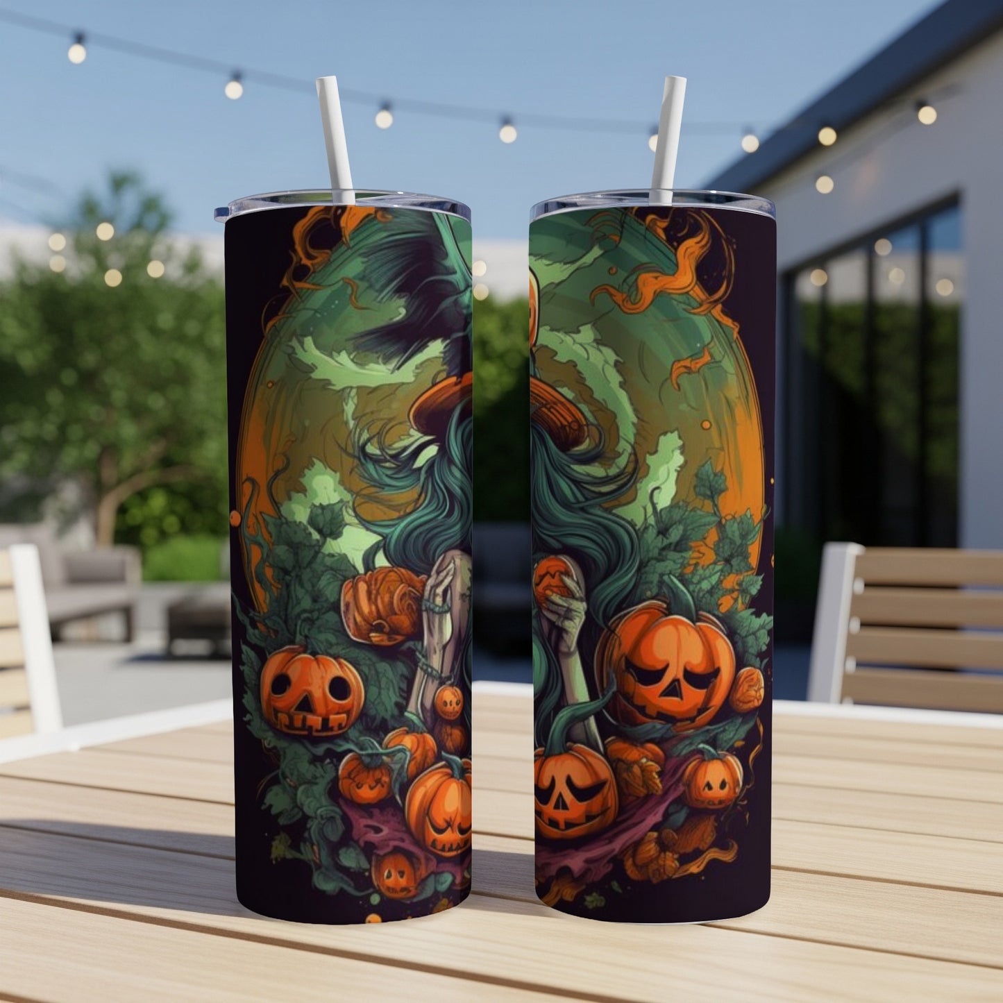 Two tumblers with a Halloween witch and pumpkin design.