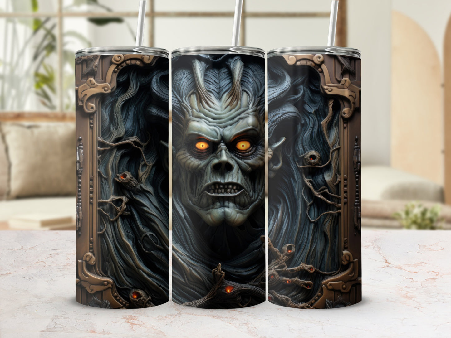 Three tumblers featuring a detailed, grimacing monster with glowing orange eyes.