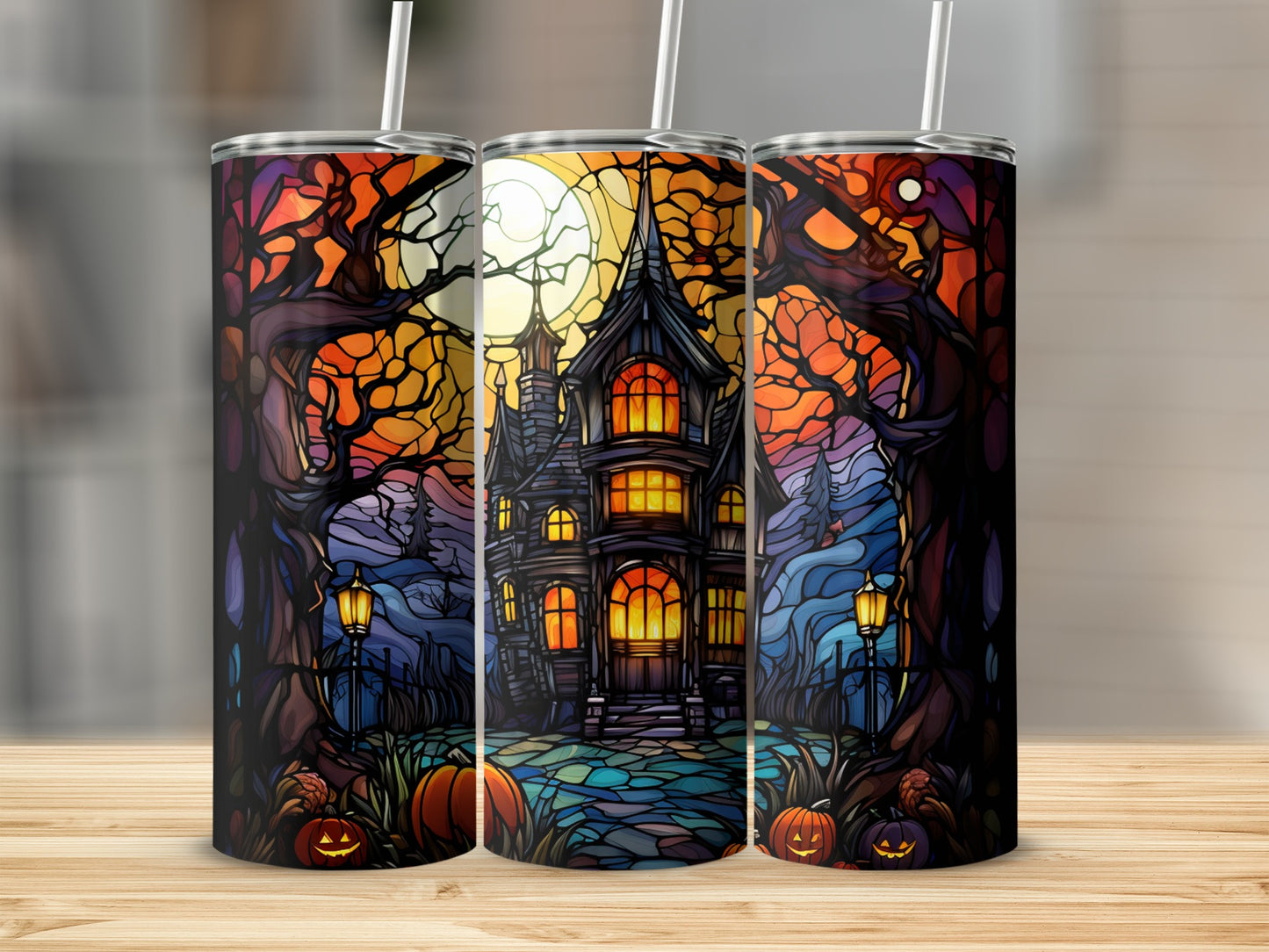Haunted house with pumpkins and moonlight, stained glass effect, on a tumbler.