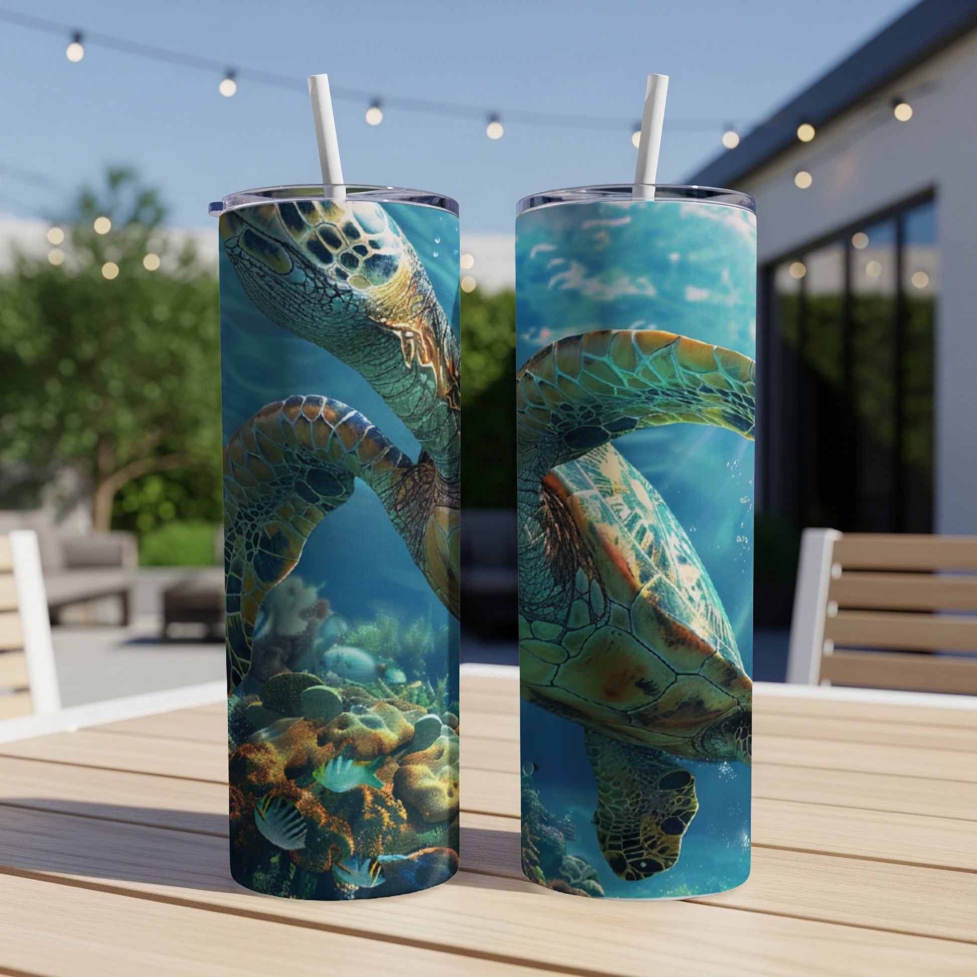 Two tumblers featuring a sea turtle swimming underwater among coral and fish.