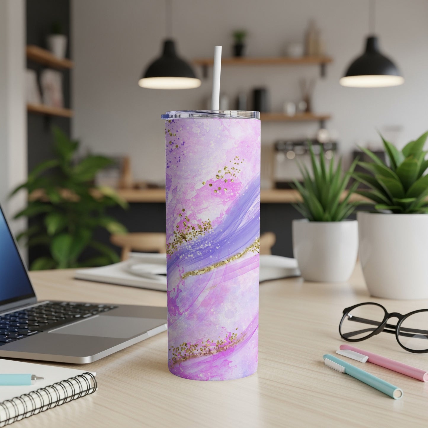 Purple and pink watercolor tumbler with gold glitter accents.