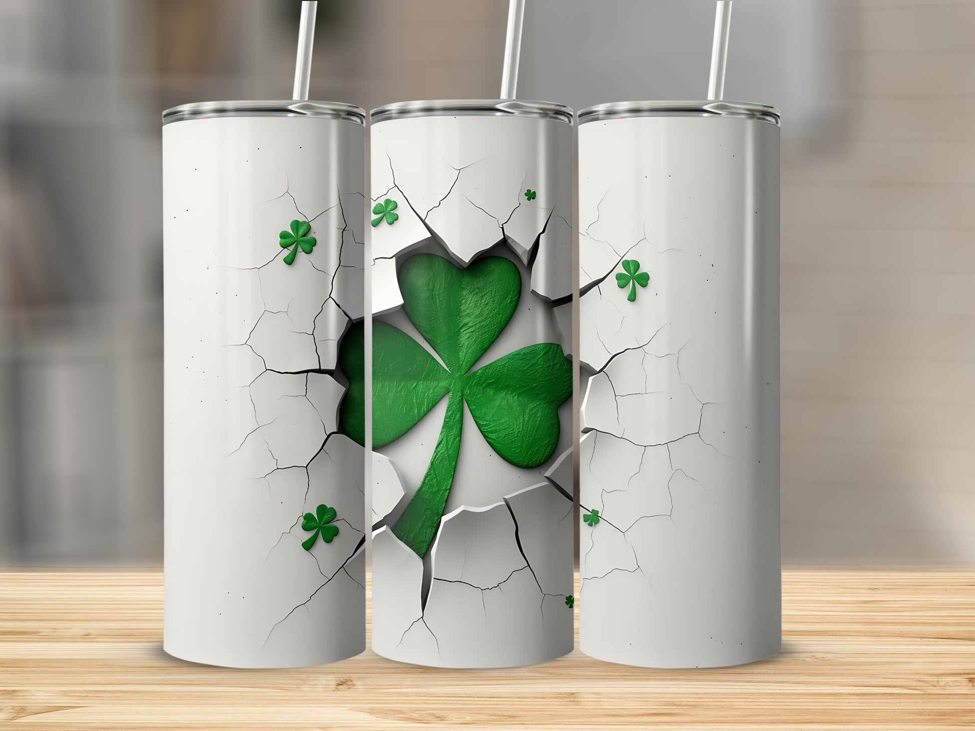White tumbler with cracked effect revealing a green shamrock design.