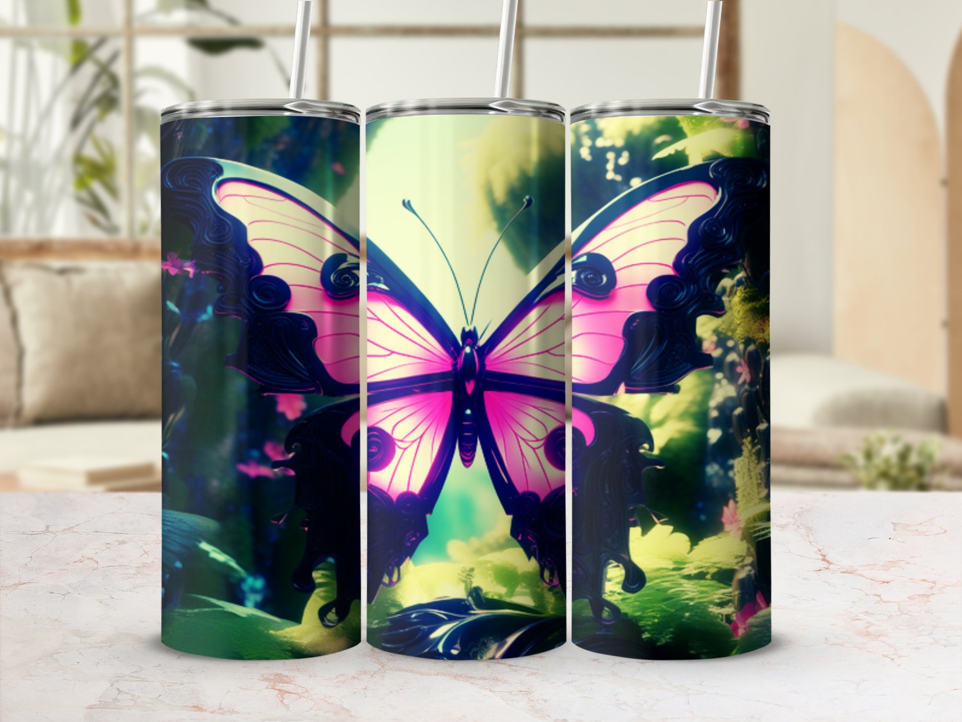 Pink butterfly illustration on three stacked tumblers with blurred background.