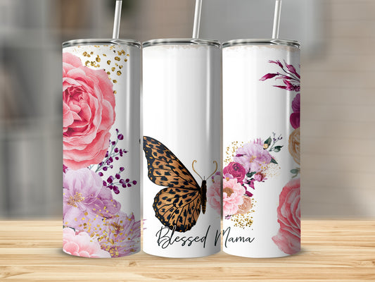 Three tumblers with floral designs and a butterfly, one saying "Blessed Mama".