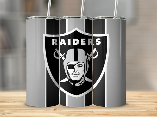 Las Vegas Raiders shield logo on three silver and black striped tumblers with straws.