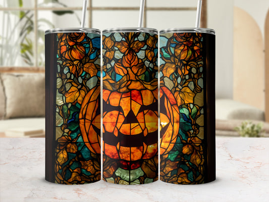 Triptych of tumblers with stained glass jack-o'-lantern design.