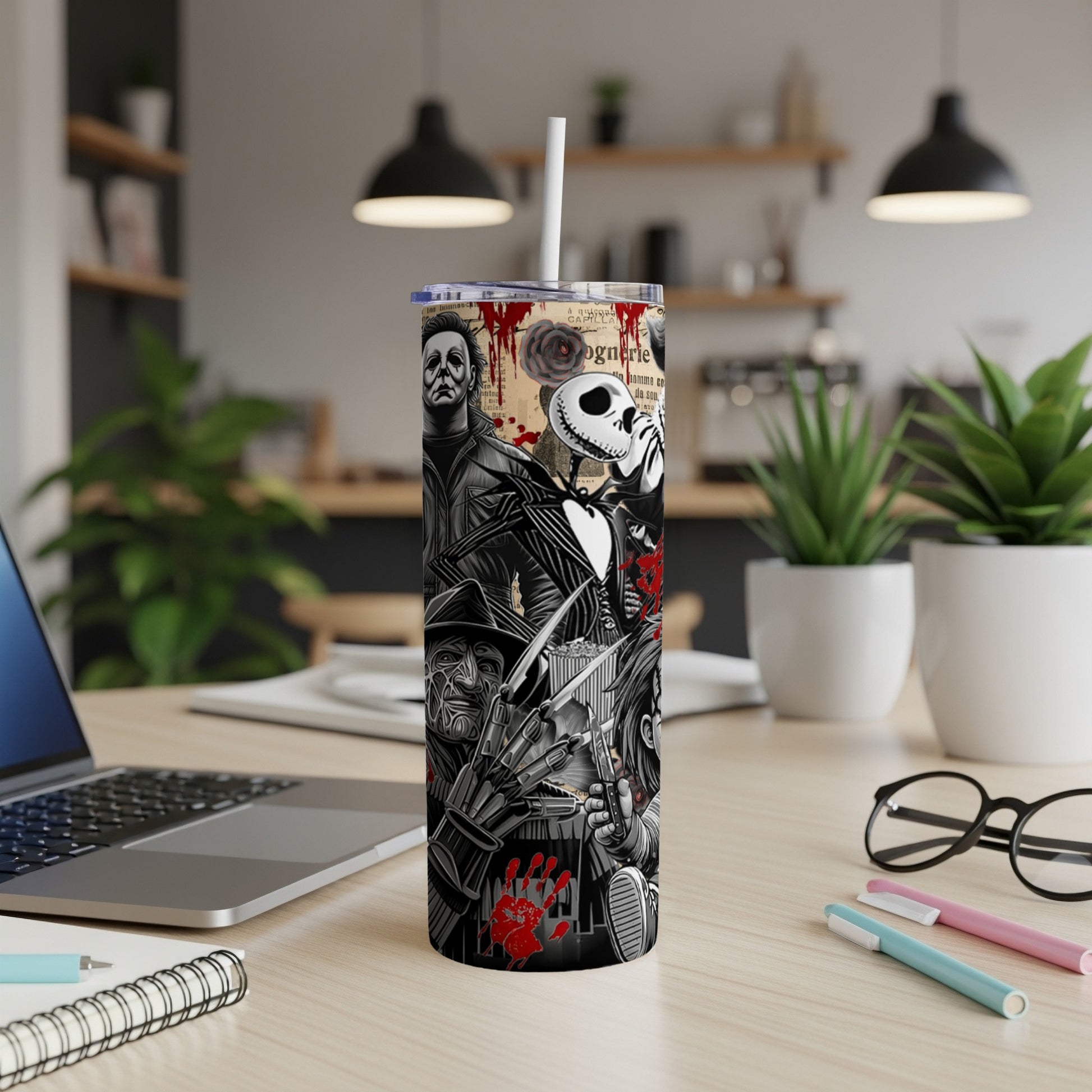 Tumbler with horror movie villains, Jack Skellington, and blood splatters.