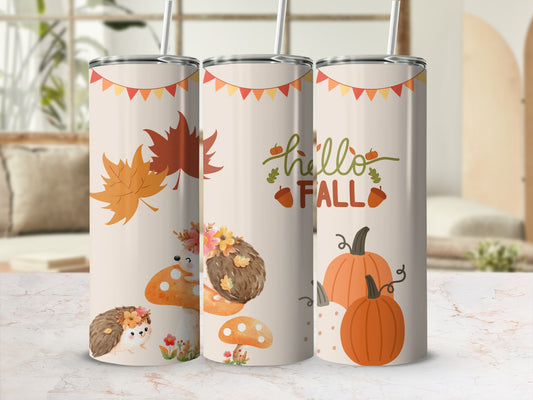 Fall themed tumbler with hedgehogs, mushrooms, leaves, and pumpkins.