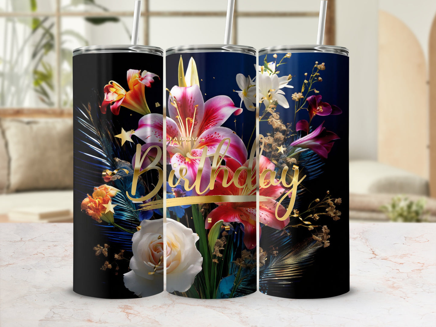 Tumbler with a gold "Happy Birthday" inscription and vibrant floral arrangement.