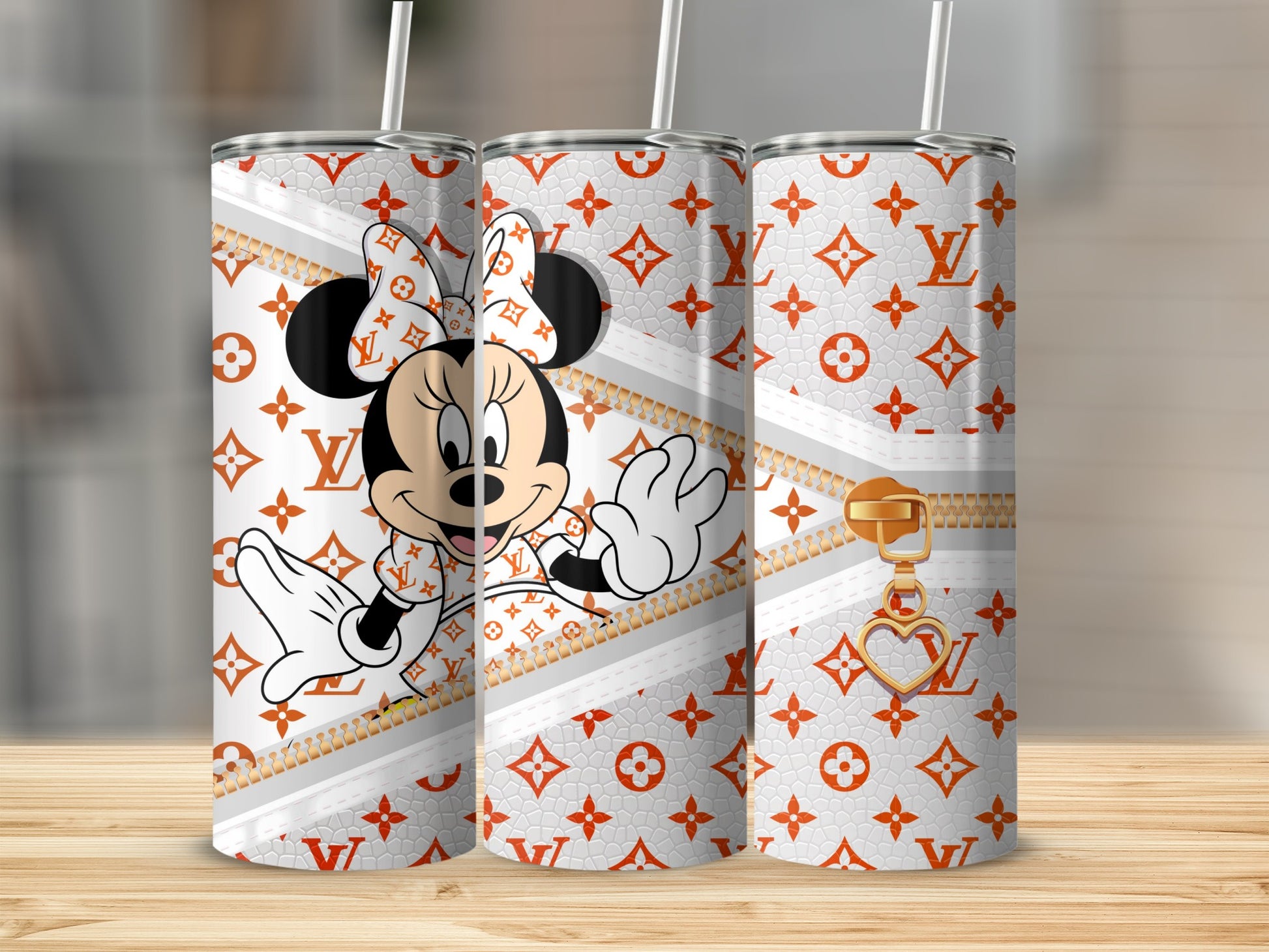 Minnie Mouse in Louis Vuitton pattern tumbler with gold zipper and heart charm.
