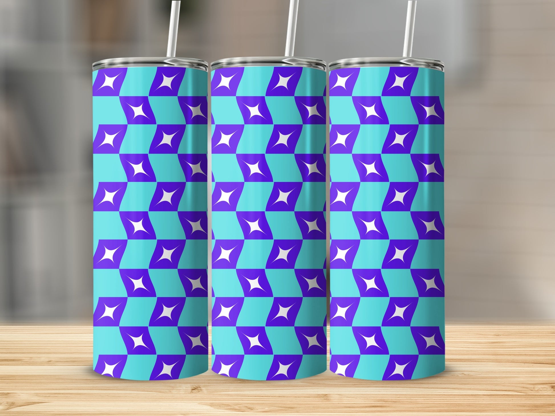 Three tumblers with a repeating purple and blue geometric pattern.