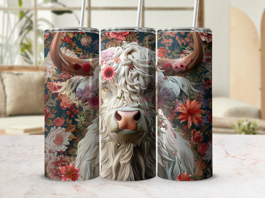 Highland cow portrait with floral embellishments and a straw in tumbler.