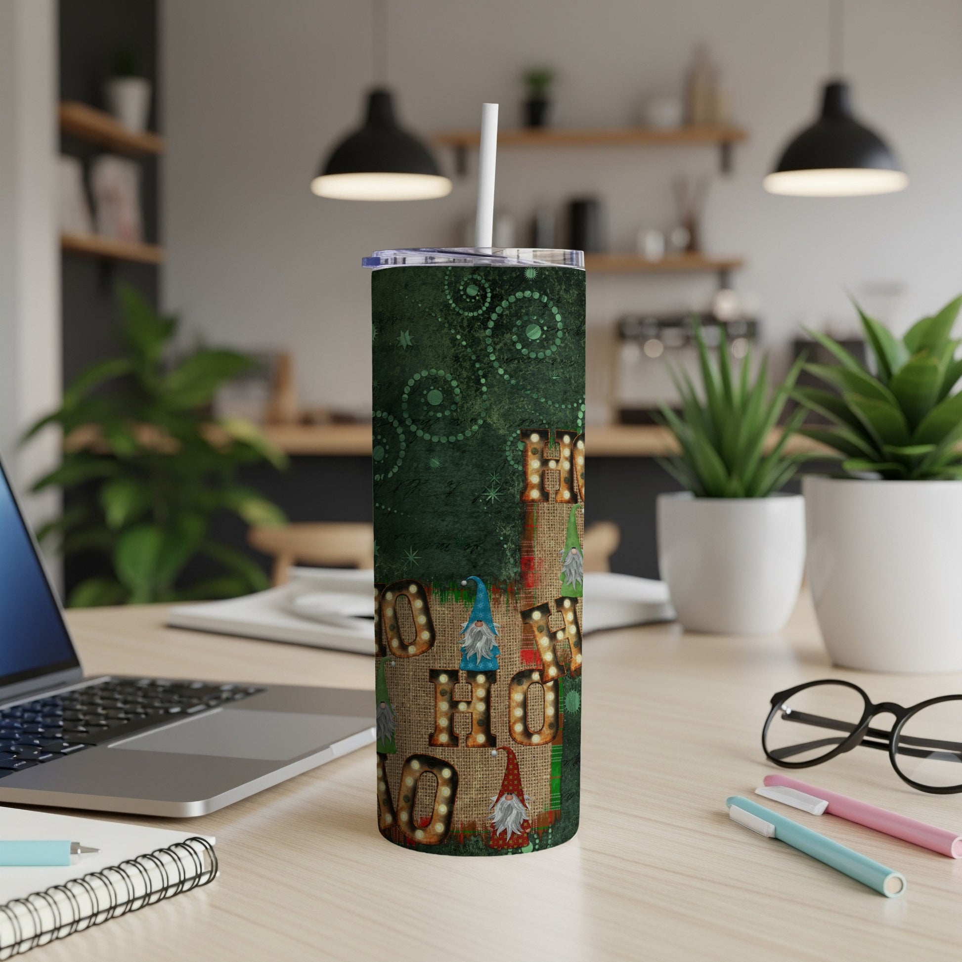 Green and burlap tumbler with "Ho Ho Ho" text and gnomes.