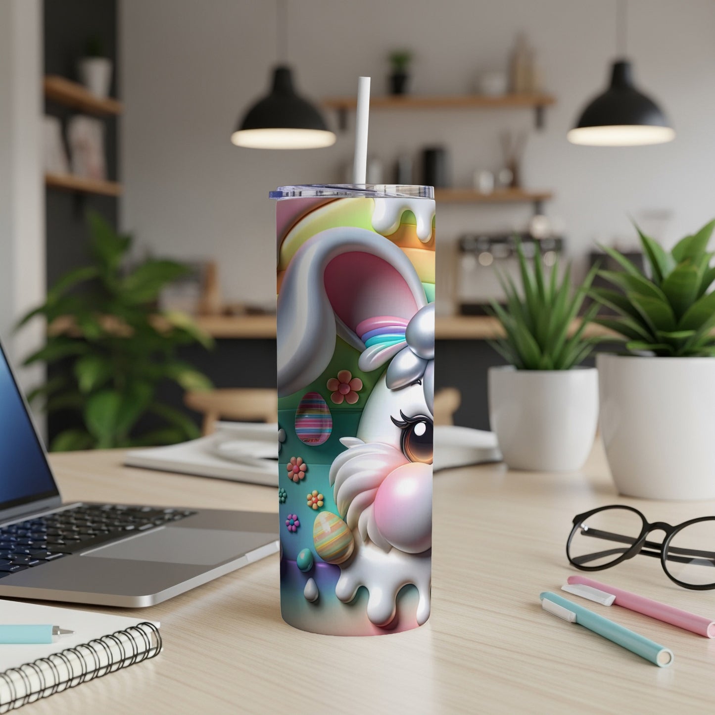 White tumbler with cartoon Easter bunny and colorful egg design.