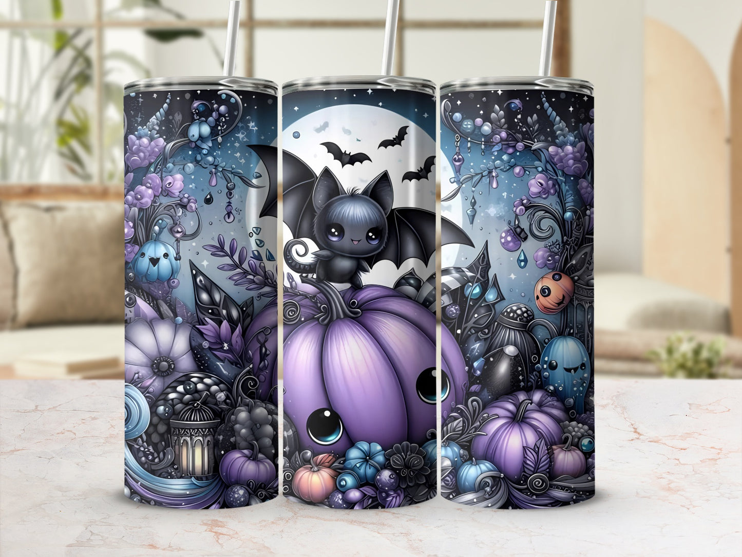 Three tumblers featuring a cute bat on a purple pumpkin with Halloween-themed foliage.