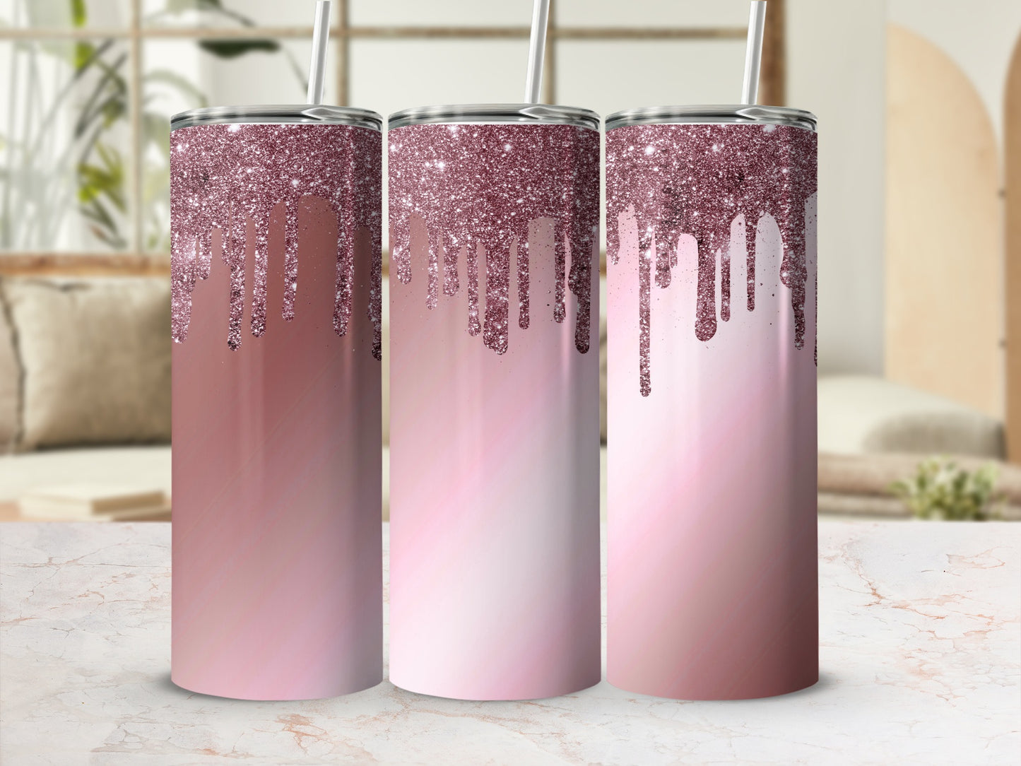Three tumblers with rose gold glitter drip ombre design.