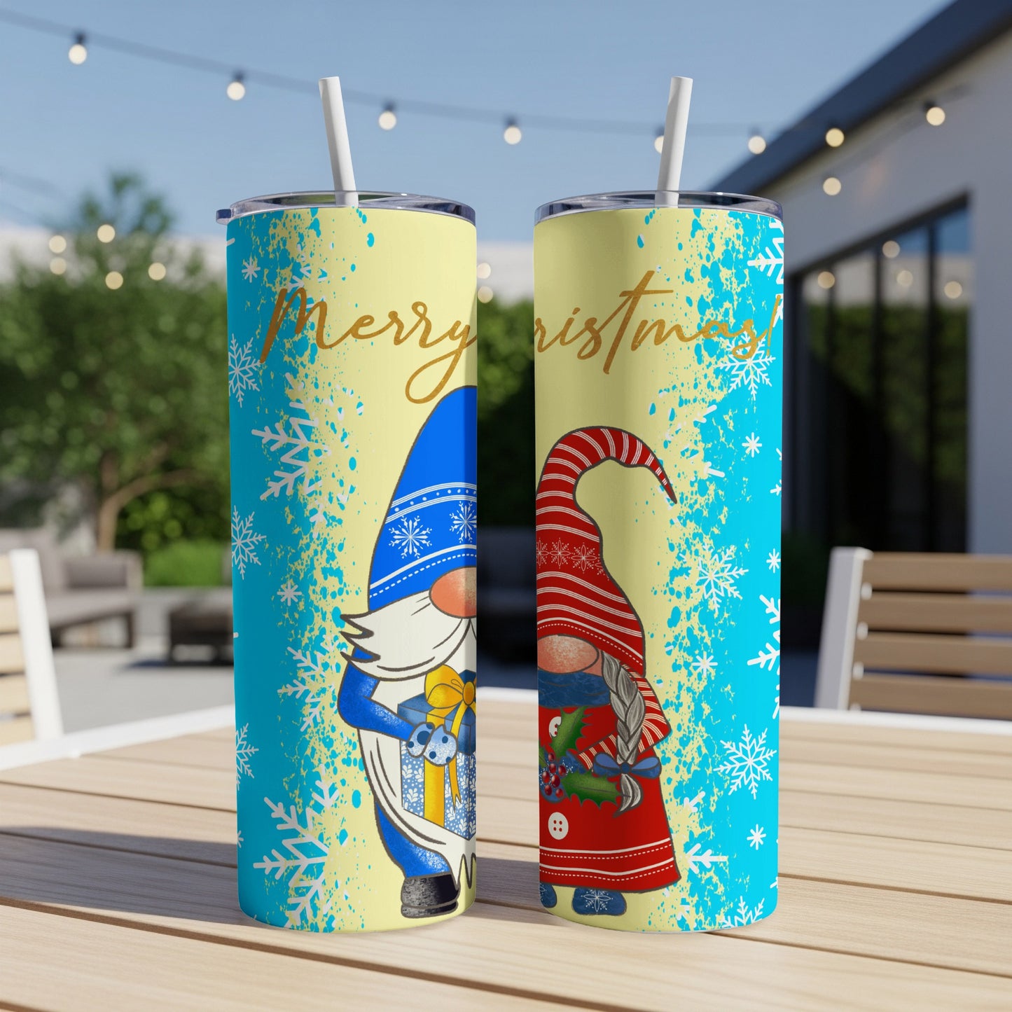 Two gnome illustrations on blue tumblers with "Merry Christmas" text.