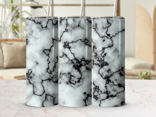 Three tumblers with a black and white marble pattern.