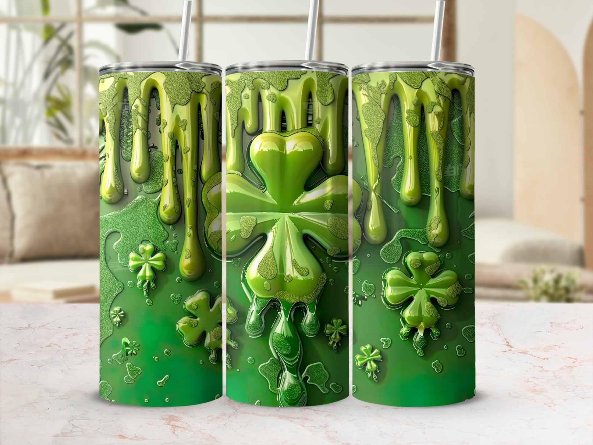 Three green tumblers with shamrock designs and dripping slime detail.