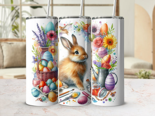 Easter bunny with painted eggs, flowers, and basket on tumblers.