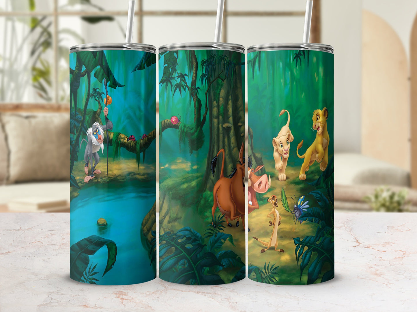 Lion King characters Simba, Timon, and Pumbaa in jungle scene on three tumblers.