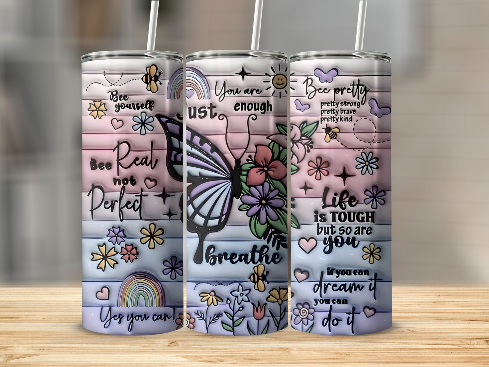 Pink and blue pastel tumbler with butterfly and inspirational quotes.