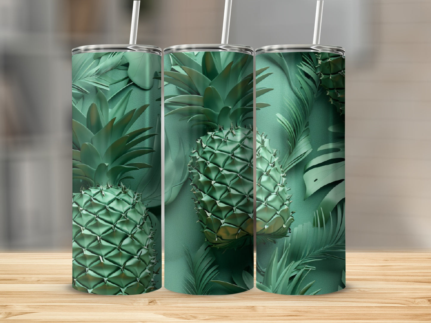 Three green tumblers with pineapple and tropical leaf pattern.