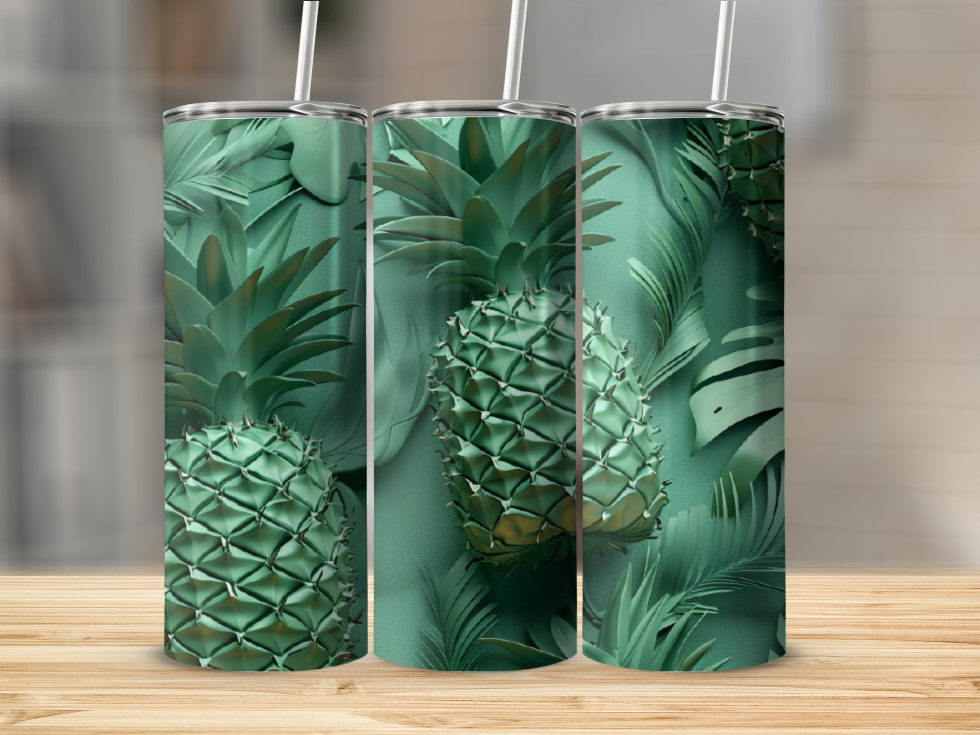 Three green tumblers with pineapple and tropical leaf pattern.