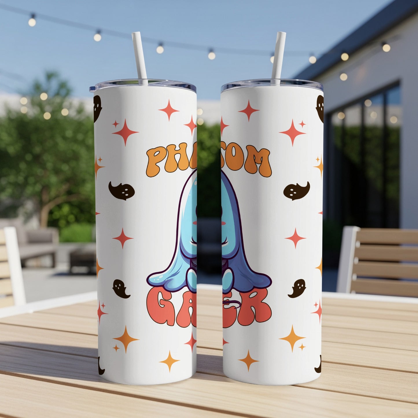 White tumbler with ghost and star pattern, "Phantom Gamer" text.