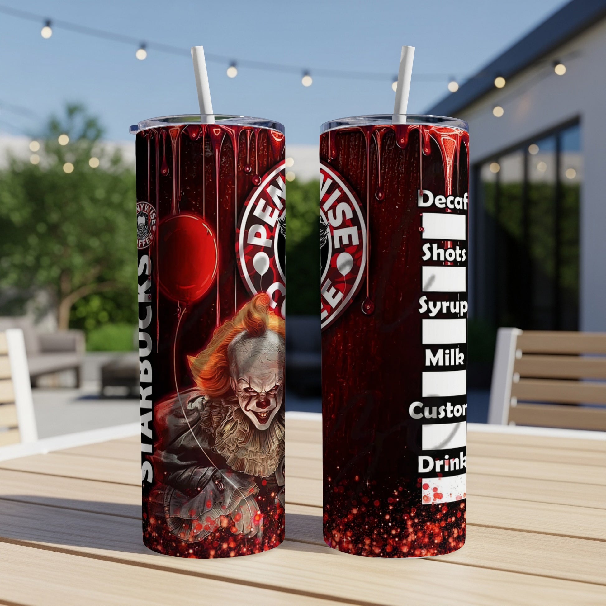 Two tumblers with a horror clown and coffee drink menu on a table.