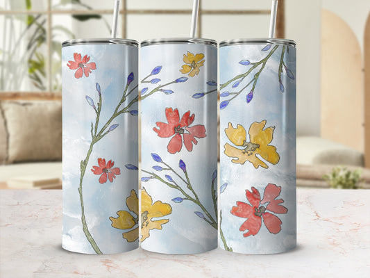 Tall tumbler with floral watercolor design, red, yellow, and blue flowers on branches.