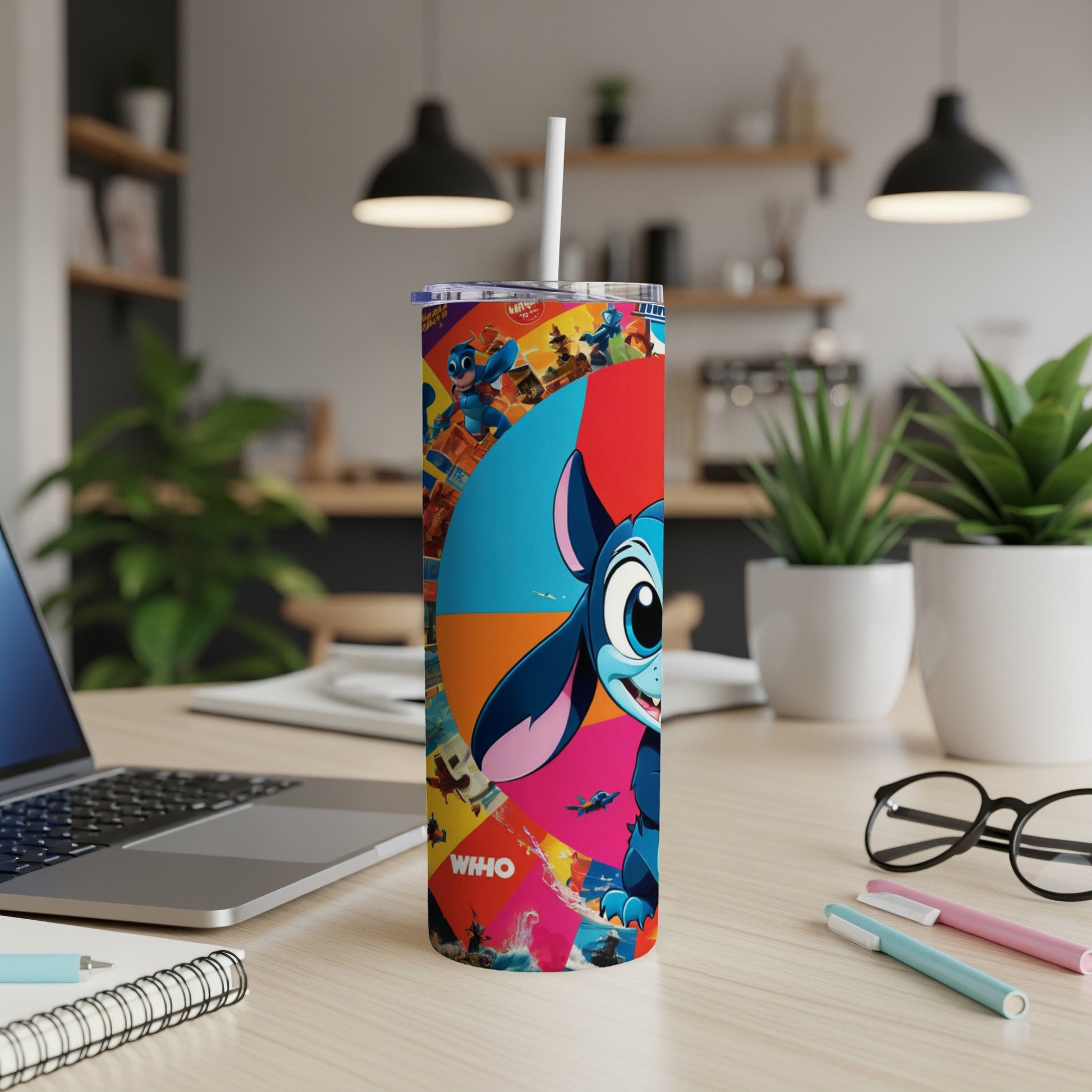 Stitch character on a colorful tumbler with straw, on a desk.