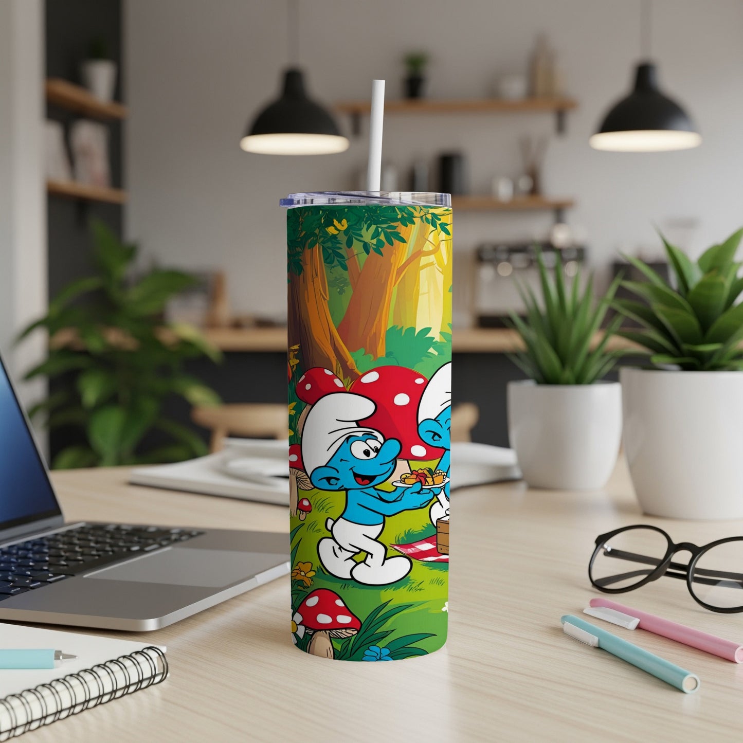 Smurfs enjoying a picnic in a forest scene on a tall tumbler.
