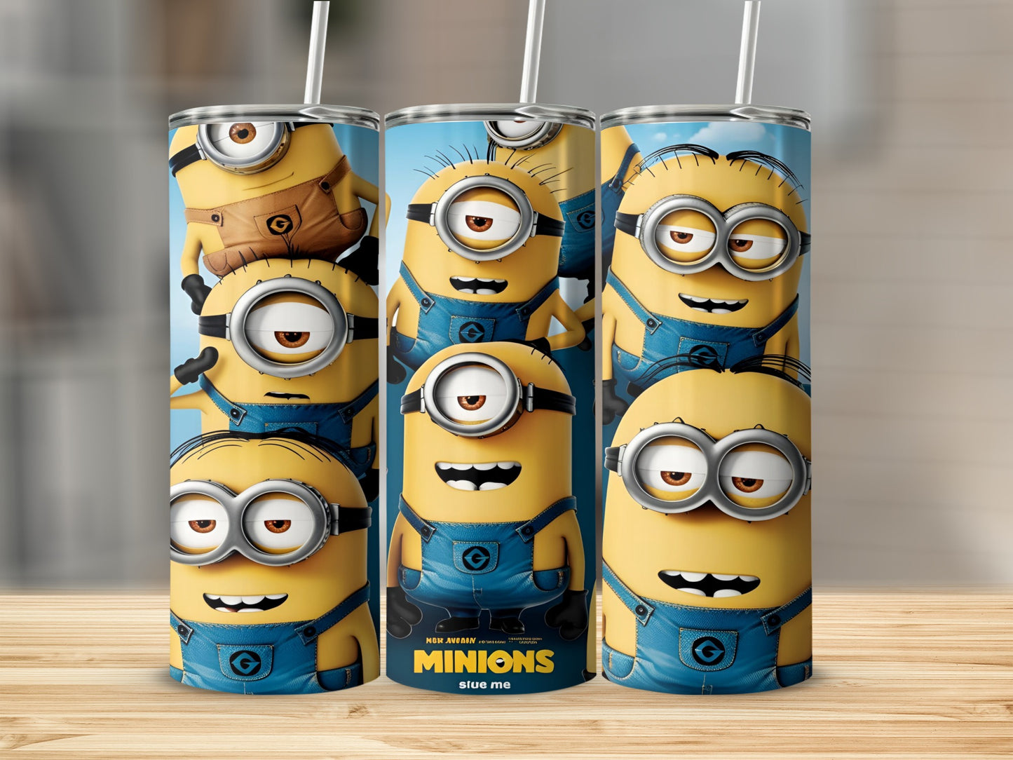 Three Minions from Despicable Me with blue overalls and goggles on tumblers.