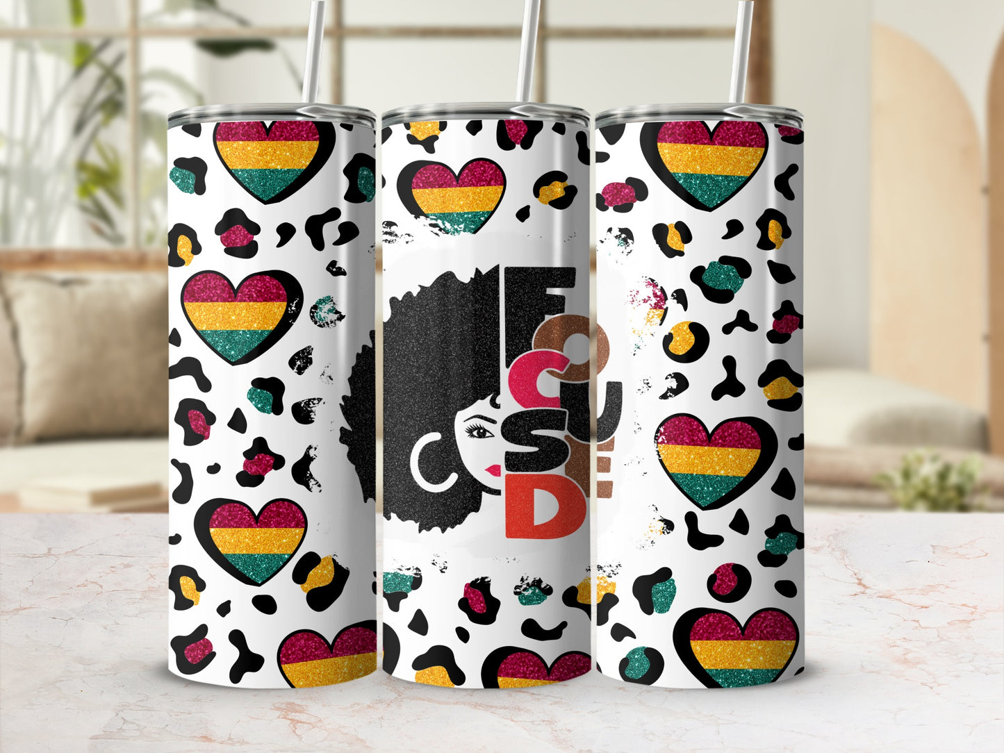 Leopard print tumbler with hearts and "Foco" text.