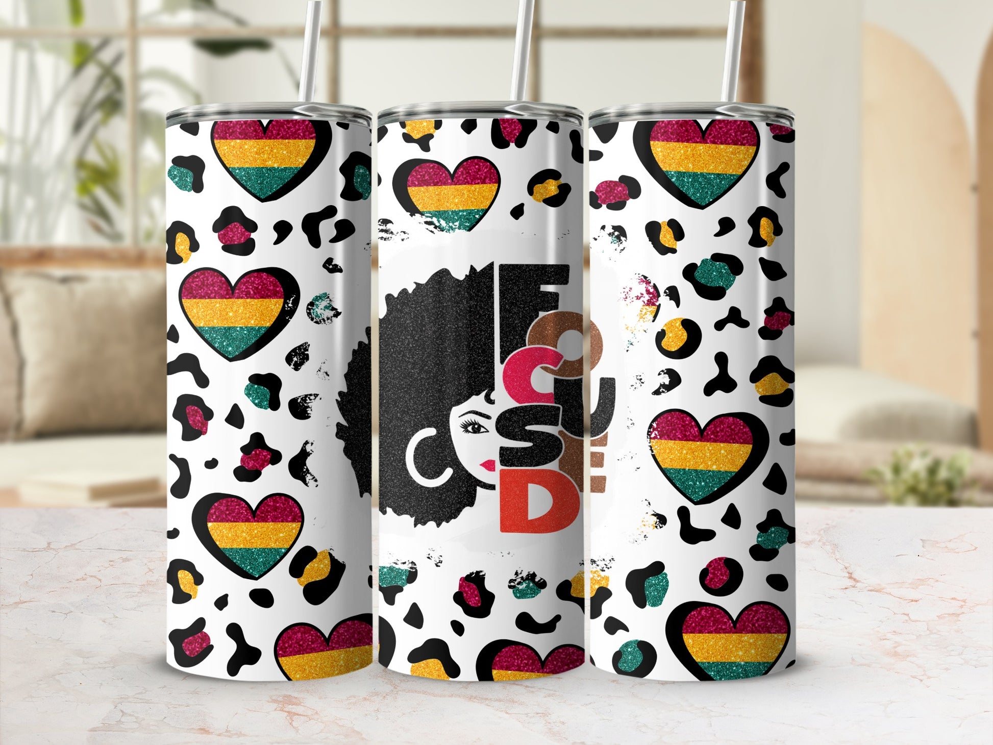 Leopard print tumbler with hearts and "Foco" text.