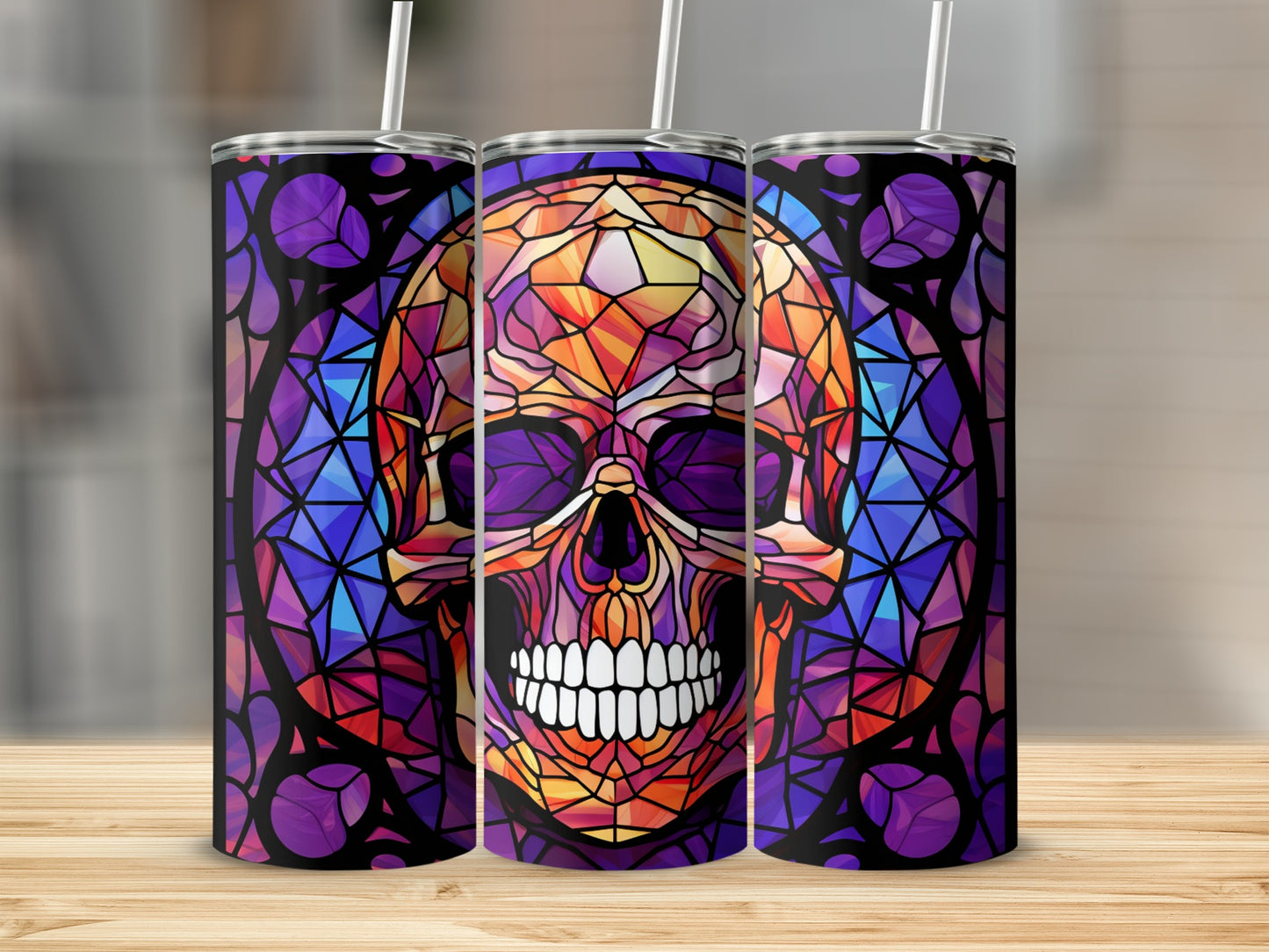 Stained glass skull design on a tall tumbler with purple and orange geometric patterns.
