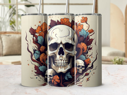 Three cream-colored tumblers with a skull and floral design.