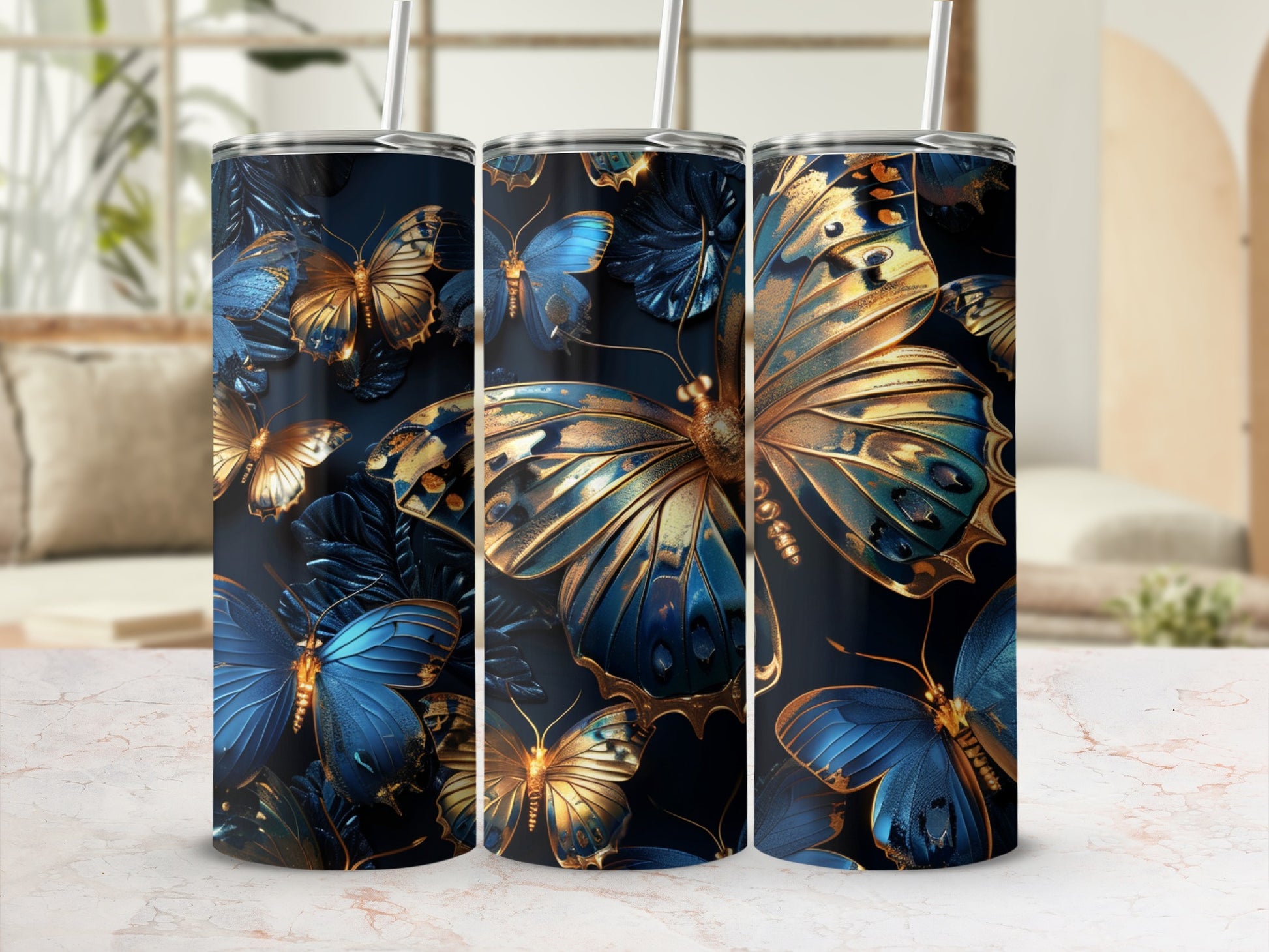 Three tall tumblers with iridescent blue and gold butterfly designs.