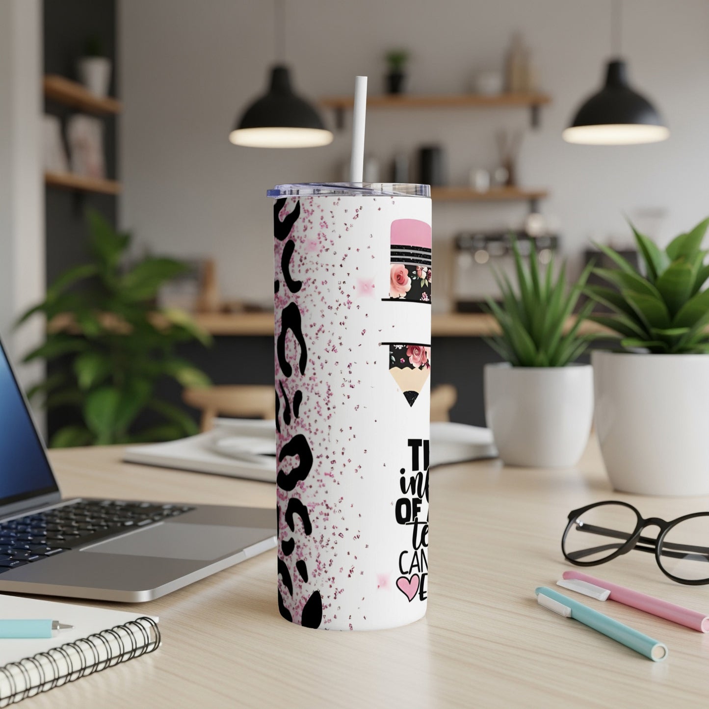 White tumbler with leopard print and floral pencil design.