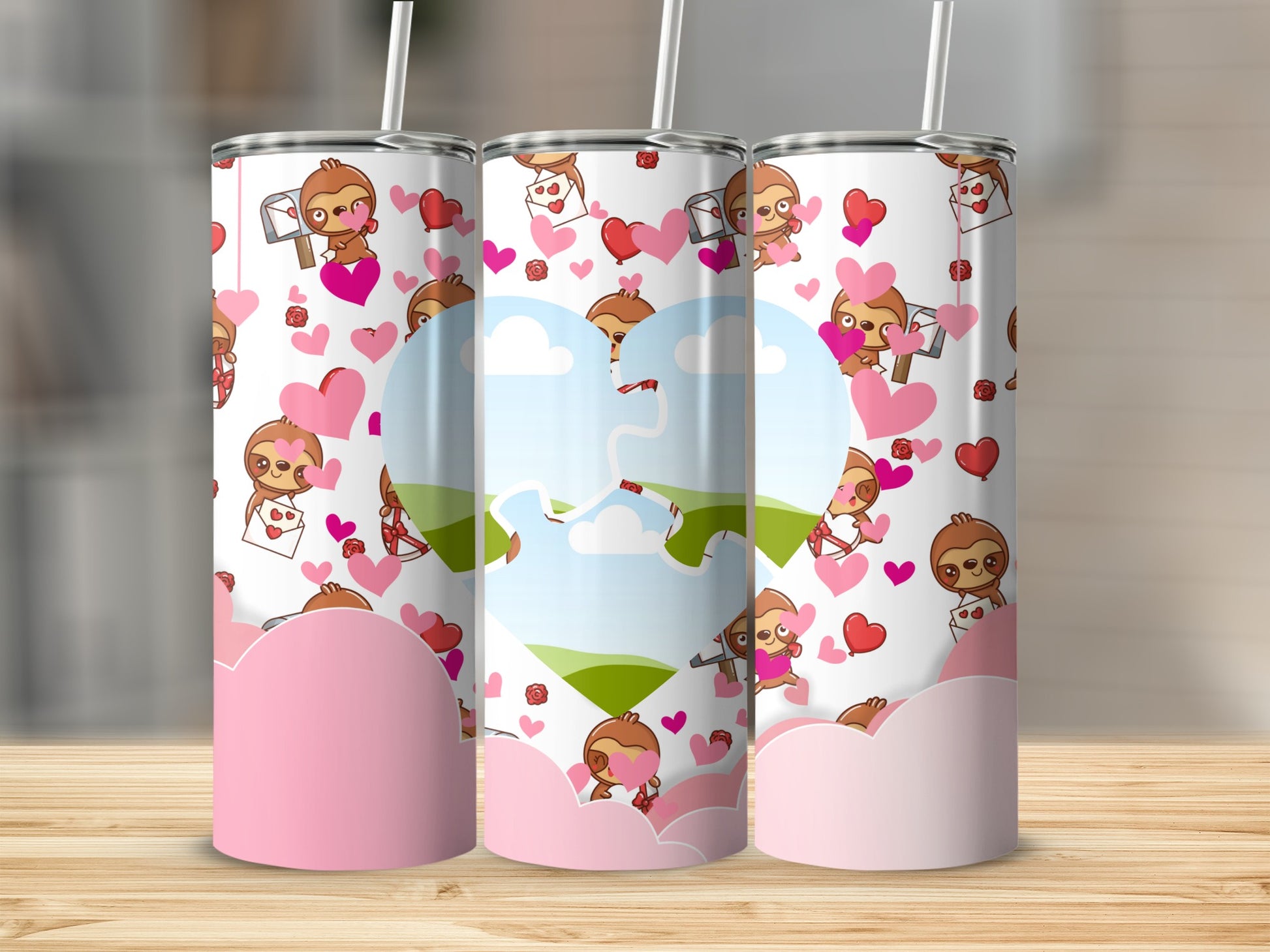 Three tumblers featuring cute sloths with hearts and envelopes, on a wooden surface.